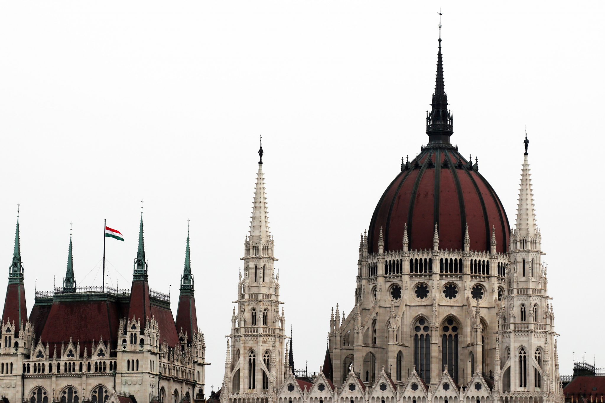 Budapest parliament winter Hungarian flag