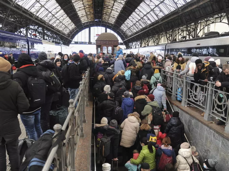 Ukrainian refugees wait for trains in Lviv