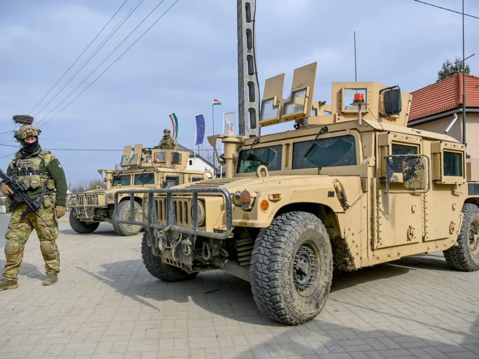 Hungarian soldiers and armed vehicles