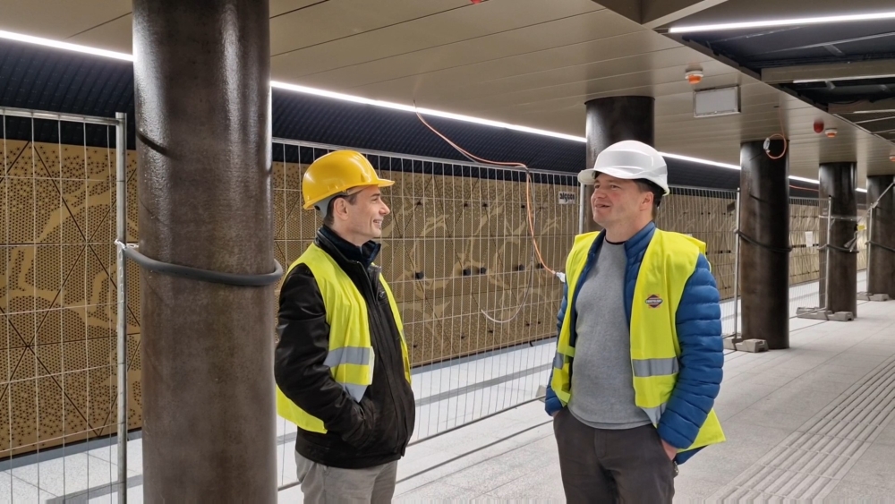 Golden coloured M3 metro station construction workers