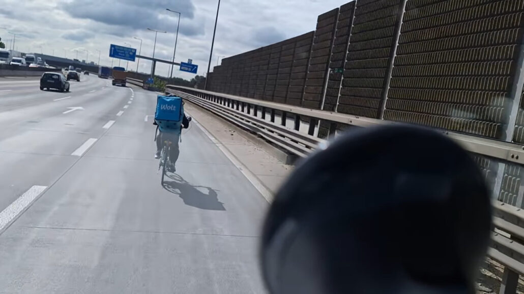 food delivery rider on the motorway