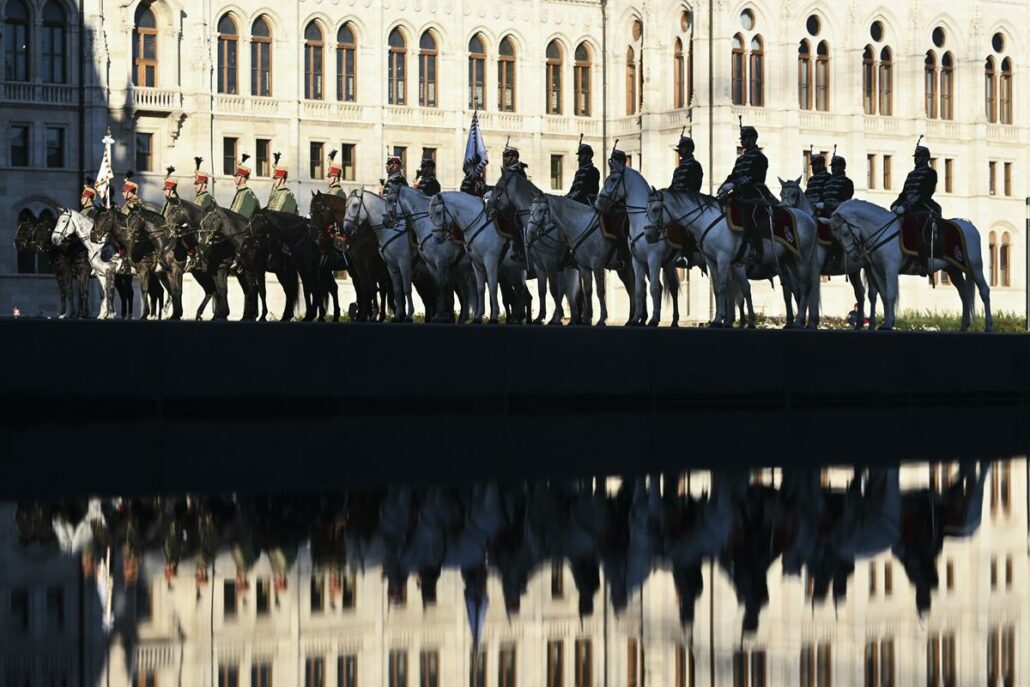 Photos: Hungarian national flag flown at half-mast in front of Parliament