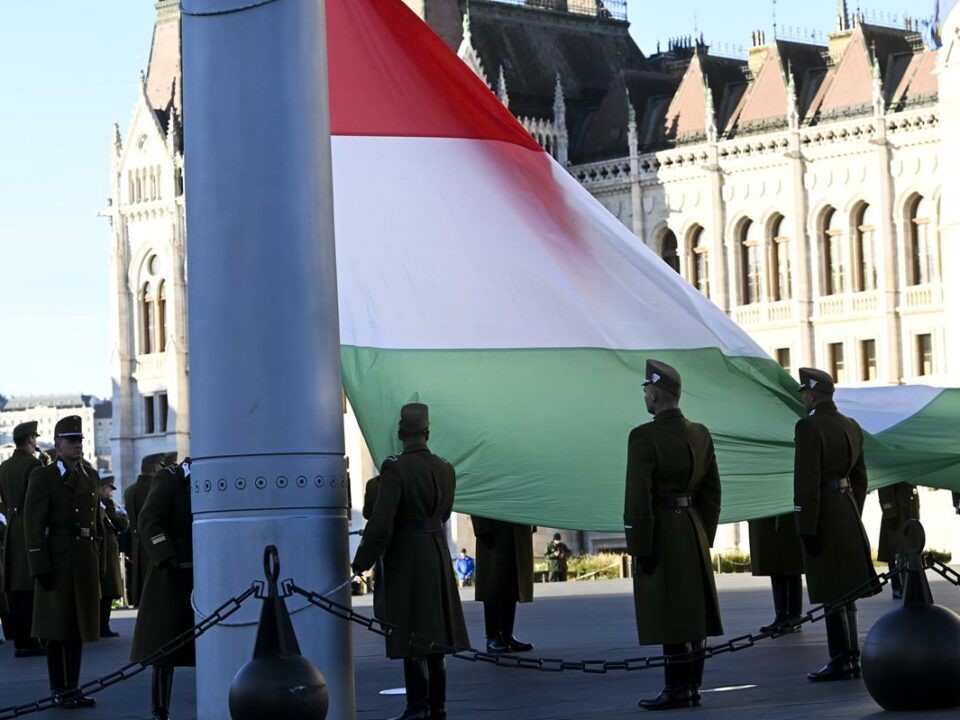 Photos: Hungarian national flag flown at half-mast in front of Parliament