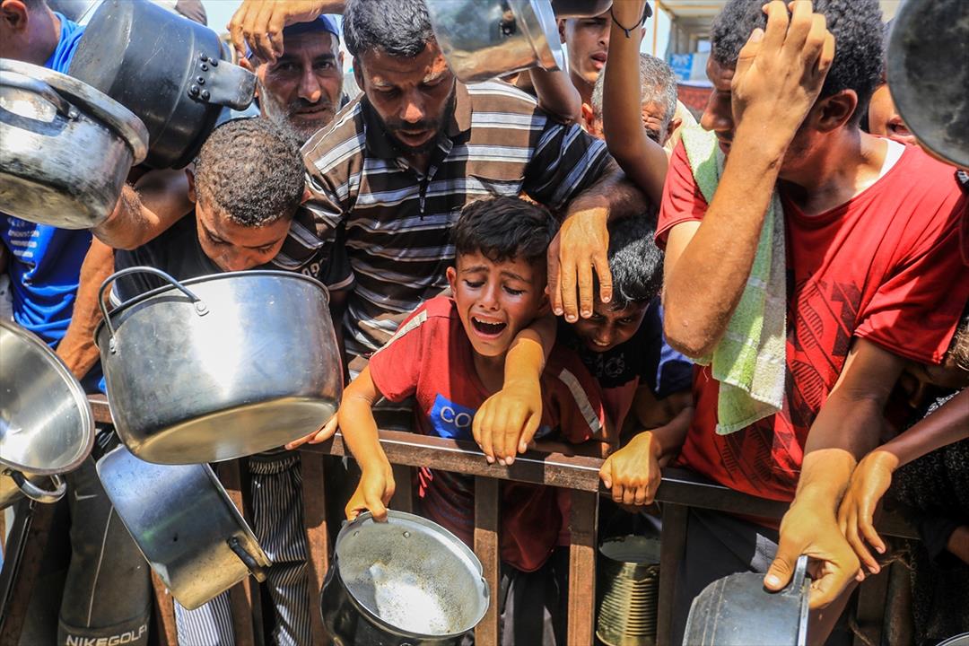 Hungry people Gaza Israeli supporter banner